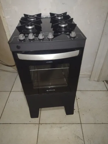 Fogão atlas 4 bocas todo de vidro lindo semi-novo pra hj temos entrega não e elétrico