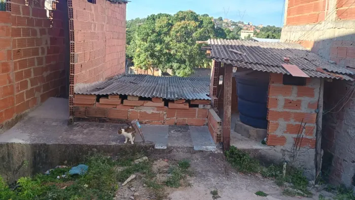 Terreno , com casa.