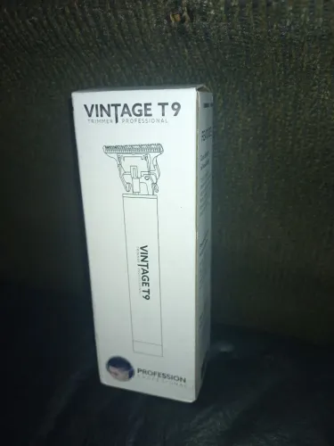 Máquina de Cabelo e Barbearia Vintage T9 Trimmer Profissional cor Prata com acessórios .