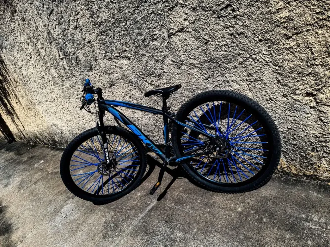 Bicicleta Sky com freio hidráulico e passador de marcha 7x3 absolute e com banco gios 