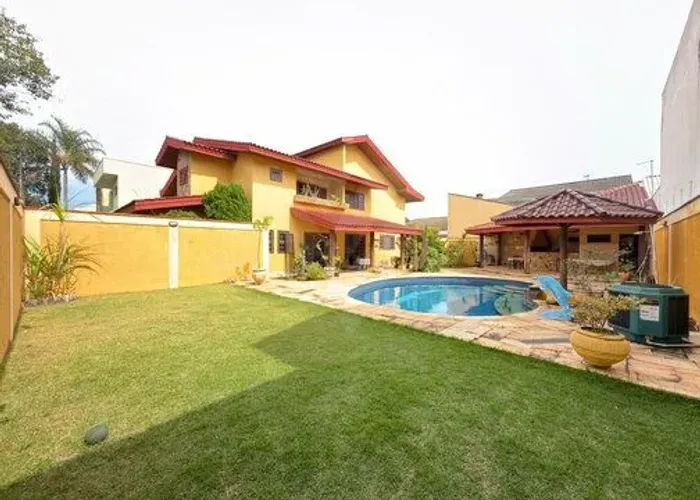 Casa com 4 dormitórios à venda, 419 m² por R$ 2.200.000,00 - Condomínio Granja Olga II - S