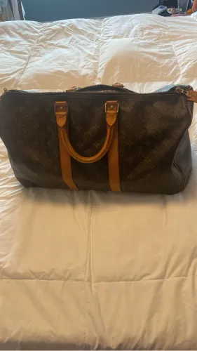 Mala de mão Louis Vuitton Monograma Keepall 45