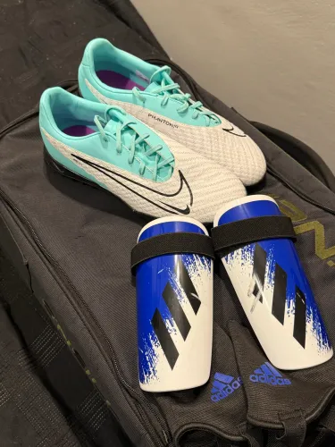 Chuteira Nike society  + Caneleira Adidas 