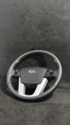 Revestimento de volante costurado 