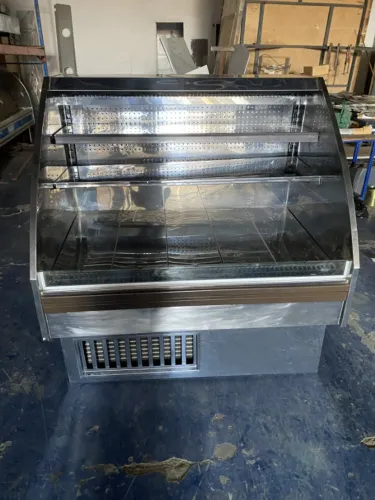 BALCÃO EXPOSITOR PARA FRIOS EMBALADOS, EM AÇO INOX, ALTO SERVIÇO, MEDINDO1,25 X 1,00X1,30 