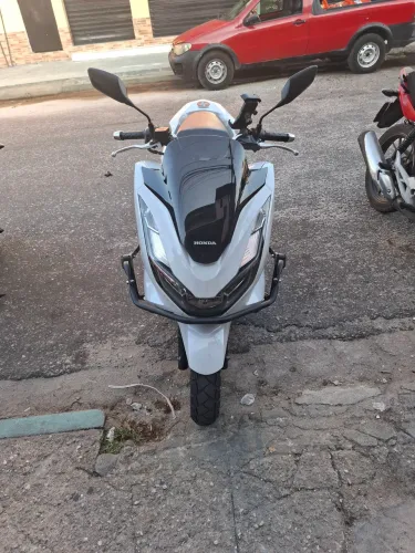 Moto ja com acessórios