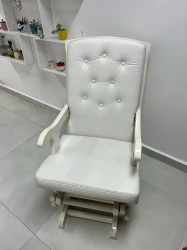 Cadeira de amamentação com balanço