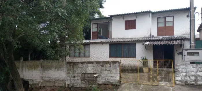 Casa 5 dormitórios, bairro Camaquã.