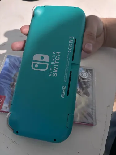 Nintendo switch lite + jogo lacrado
