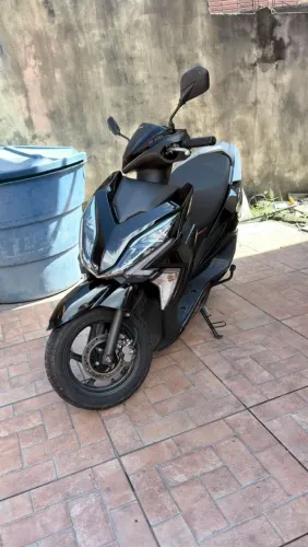 Moto pouco rodada bem conservada.