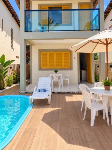 Duplex a 50m da praia com piscina e churrasqueira