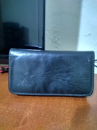 Estojo de celular para carregar na cintura.