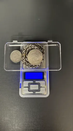 vendo lote antigo de prata 900, 70,86 gramas, contendo 2 moedas uruguaia