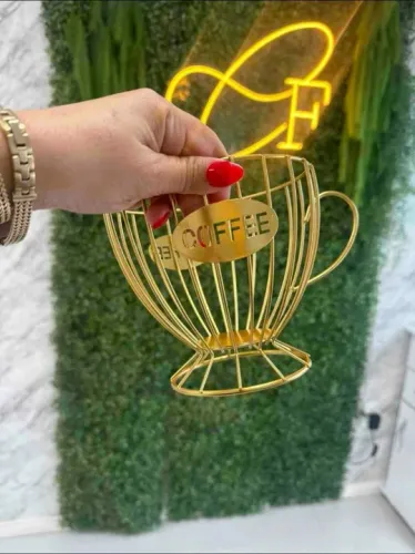 Porta cápsulas de café em formato de xícara