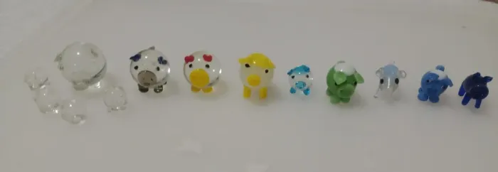 Lote 13 miniaturas porquinhos de vidro