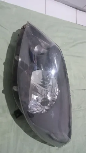 Farol pra sandero Renault 2010 esquerdo