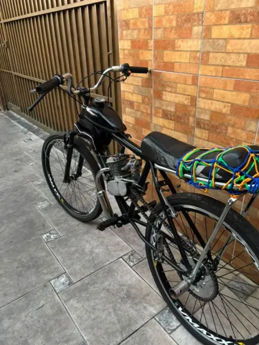 Bicicleta motorizada em bom estado