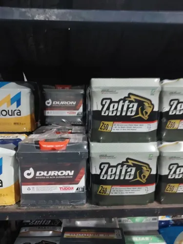 Troca de oleo baterias heliar zetta moura pneus calotas 10x
