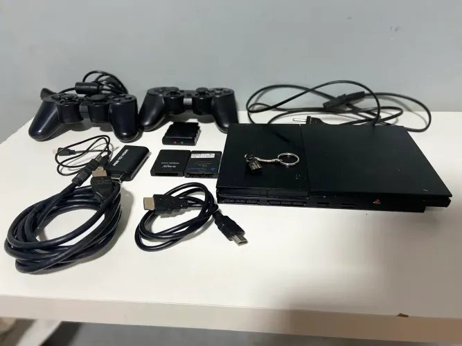 PlayStation 2 Slim completo