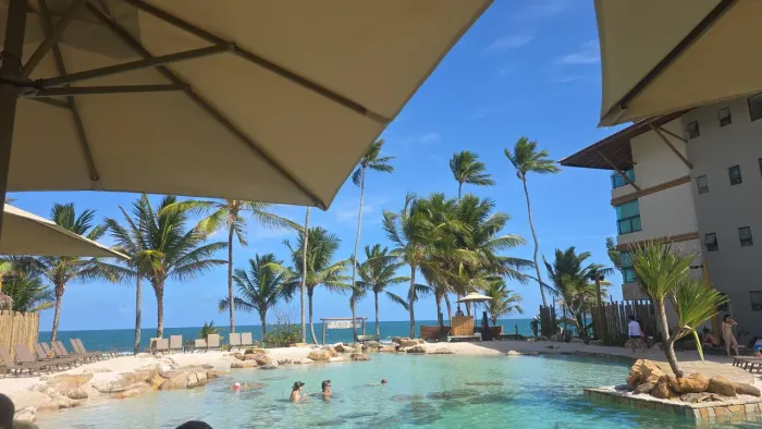 Apartamento em resort beira mar na praia de muro alto