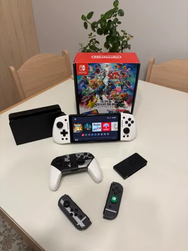 Nintendo Switch OLED Edição Smash Bros + Controle Pro Smash Bros + Controle Linyuvo