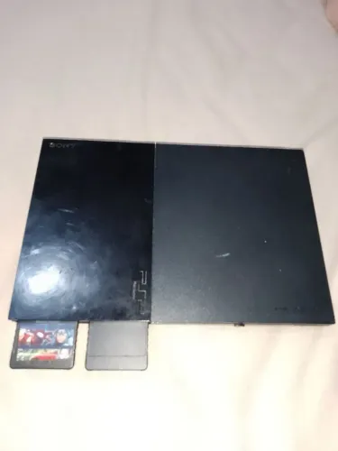Dois play 2 a venda com 3 controle e dois jogos 
