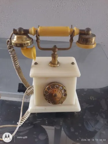 Vendo um telefone antigo vintage de mármore ( usado )