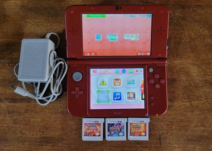 New Nintendo 3DS XL + 3 jogos Pokemon sun omega Y