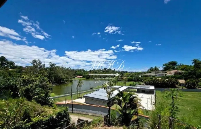 Chácara com 3 dormitórios à venda, 5900 m² por R$ 1.400.000,00 - Condomínio Lagoinha - Jac