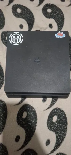 Playstation 4 slim 1Tb com 12 jogos e 2 controles cabos inclusos