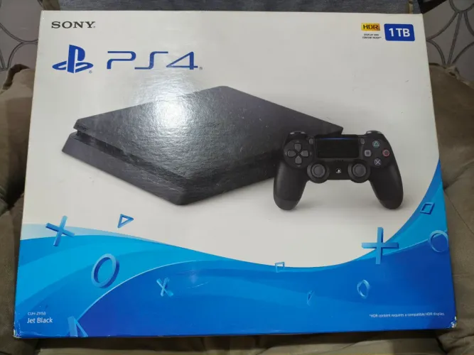 PlayStation 4 Slim 1 TB com 3 Jogos FIFA 18, UntilDawn, Call of Duty Modern Warfare. 