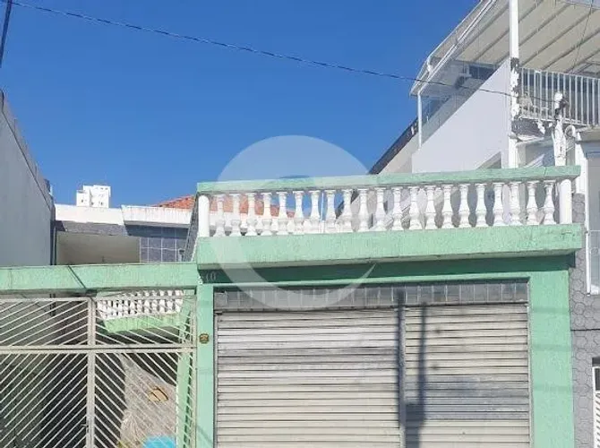 casa com edícula e quintal arvores frutíferas