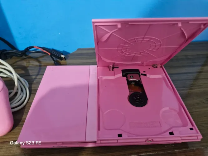 Ps2 slim rosa ,leia todo anúncio.