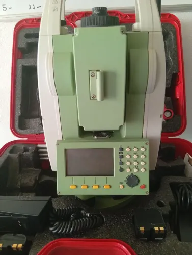 Máquina topográfica.