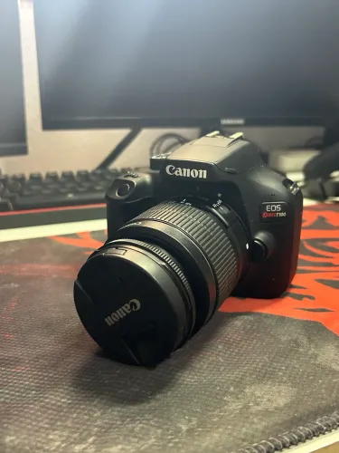 CANON T100