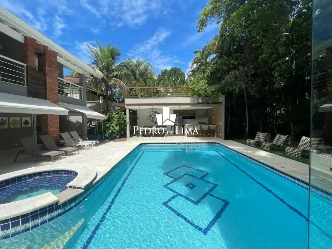 Casa com 5 dormitórios à venda, 373 m² por R$ 4.700.000,00 - Riviera - Módulo 28 - Bertiog