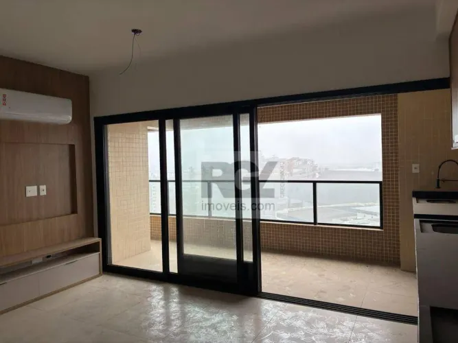 Apartamento com 2 dormitórios para alugar, 65 m² por R$ 6.500,00/mês - Ponta da Praia - Sa