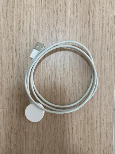 Carregador magnético para Apple Watch original.