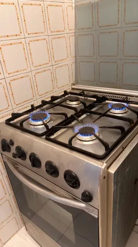 Fogão Inox General Electric 4 bocas de embutir mas com opção de pés convencionais 