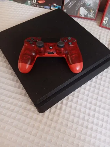 PS4 slim + 5 jogos só os jogos já valem mil reais