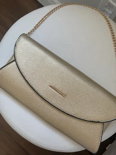 Vendo bolsa Constance dourada festa 