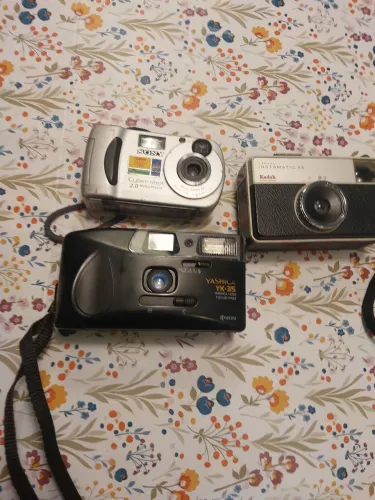 Vendo três máquina fotográfica antiga