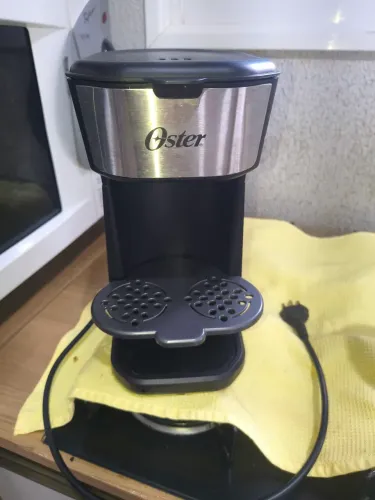 Cafeteira Oster Inox com Copo Térmico 