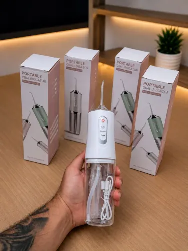 Irrigador bucal portátil 