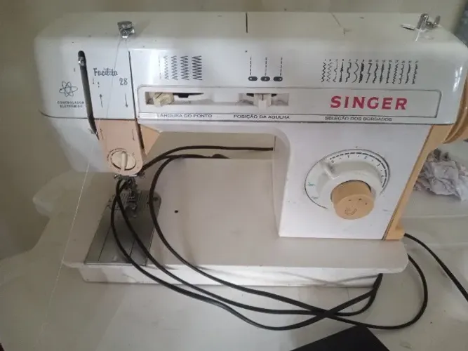 Máquina de costura singer