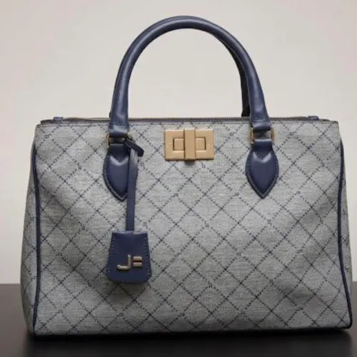 Bolsa tote grande da Jorge Bischoff em monograma alças e acabamentos em tom escuro