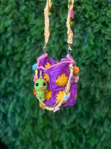 Bolsa Rapunzel infantil de crochê 