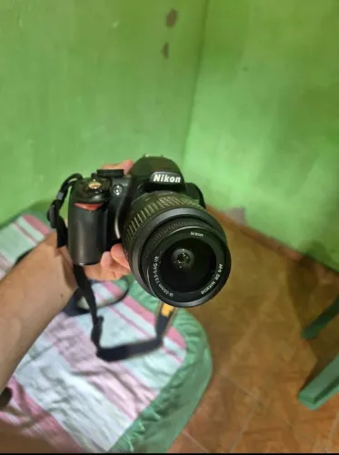 Nikon D3100 - Usada (Obturador trava quando vai fazer gravação)