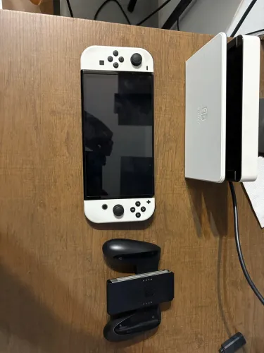 Nintendo switch oled vendo ou troco em new 3ds