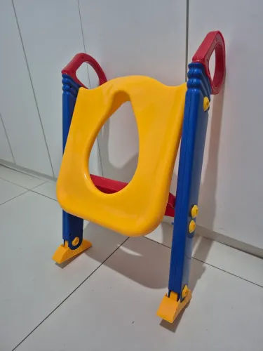 Troninho redutor de assento.